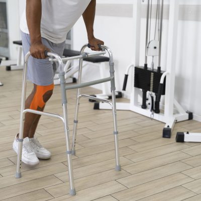 injured-man-doing-physiotherapy-exercises-walking